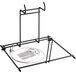 A black metal countertop rack kit with a clear plastic tray and a wire bowl on a table.