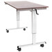 A white and brown Luxor stand up desk with wheels.