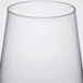A close up of a Stolzle Revolution wine glass with a white background.