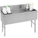 A stainless steel Advance Tabco ice bin and bottle storage combo unit with white containers.