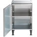 A stainless steel rectangular cabinet with a black door open.