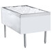 A stainless steel Advance Tabco Prestige Pass-Through Ice Bin with ice in a white rectangular container.