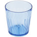 A blue plastic tumbler with a wavy design.