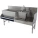 A stainless steel Advance Tabco Uni-Serv Speed Bar with two sinks on a counter.