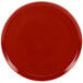 A red Fiesta china baking tray with a circle in the middle.