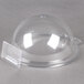 A clear plastic dome with a clear plastic lid.
