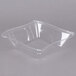A clear Fineline PET bowl with a domed lid.