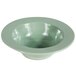 A green Elite Global Solutions Cottage Vintage California bowl with a white rim.