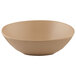 An Elite Global Solutions irregular-shaped melamine bowl in beige.