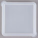 A clear polypropylene lid on a white square crock.