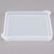 A clear square lid on a white square deli crock.