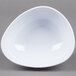 A white GET Coralline triangle melamine bowl with a small hole in the middle.