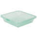 A green plastic square container with a lid.