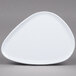 A white GET Coralline melamine triangle plate with a textured pattern.