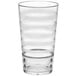 A clear plastic tumbler with a white stripe.