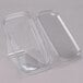 A clear plastic Tamper Evident sandwich wedge container with a clear lid.