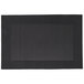 A black rectangular Snap Drape Taos Charcoal placemat with a white border.