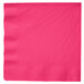 A hot magenta pink Creative Converting paper dinner napkin with a white background.
