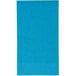 A turquoise blue paper napkin.