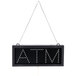 A black rectangular LED sign with white "ATM" text.