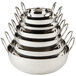 A stack of silver stainless steel American Metalcraft balti dishes with handles.