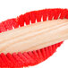 A red Oreck brushroll.