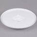 A white plastic dish with a circular hole in the middle.
