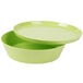 A lime green melamine bowl with a lid.