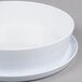 A white melamine bowl with a white lid.
