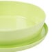 A lime green melamine bowl with a matching lid.