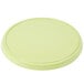 A green plastic lid on a white background.