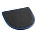 A detached navy vinyl seat cushion with a small hole in it.