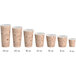 A row of Choice paper cups with a brown cafe design and text on them.
