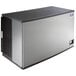 A large rectangular air cooled ice machine with a black and silver finish.