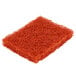 A red 3M Scotch-Brite Quick Clean Heavy-Duty Griddle Pad on a white background.