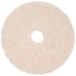 A white circular 3M TopLine Speed burnishing pad with a hole in the middle.
