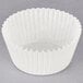 A Hoffmaster white fluted cupcake wrapper.