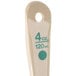 A beige polycarbonate spoon with a green handle.