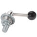 A close-up of a metal and black ball valve handle.