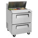 A Turbo Air stainless steel refrigerated sandwich prep table with 2 drawers.