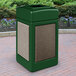 A Commercial Zone StoneTec decorative waste receptacle in forest green with riverstone panels on a brick surface.