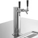 A black Beverage-Air kegerator with two silver taps on a counter.