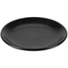 A Hall China by Steelite International Foundry black coupe plate with a rim.