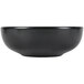 A black Hall China bistro bowl with a white background.