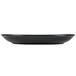 A black rectangular Hall China platter with a white border.