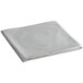 A folded sheet of shimmering silver plastic with a white background.
