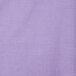 A close up of a luscious lavender purple table cover with a white background.