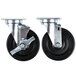 A pair of Vulcan and Wolf equivalent casters with black rubber wheels.