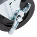A close-up of a 5" replacement swivel plate caster wheel with a black and white design.