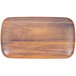 A Carlisle rectangular melamine tray with a woodgrain finish.